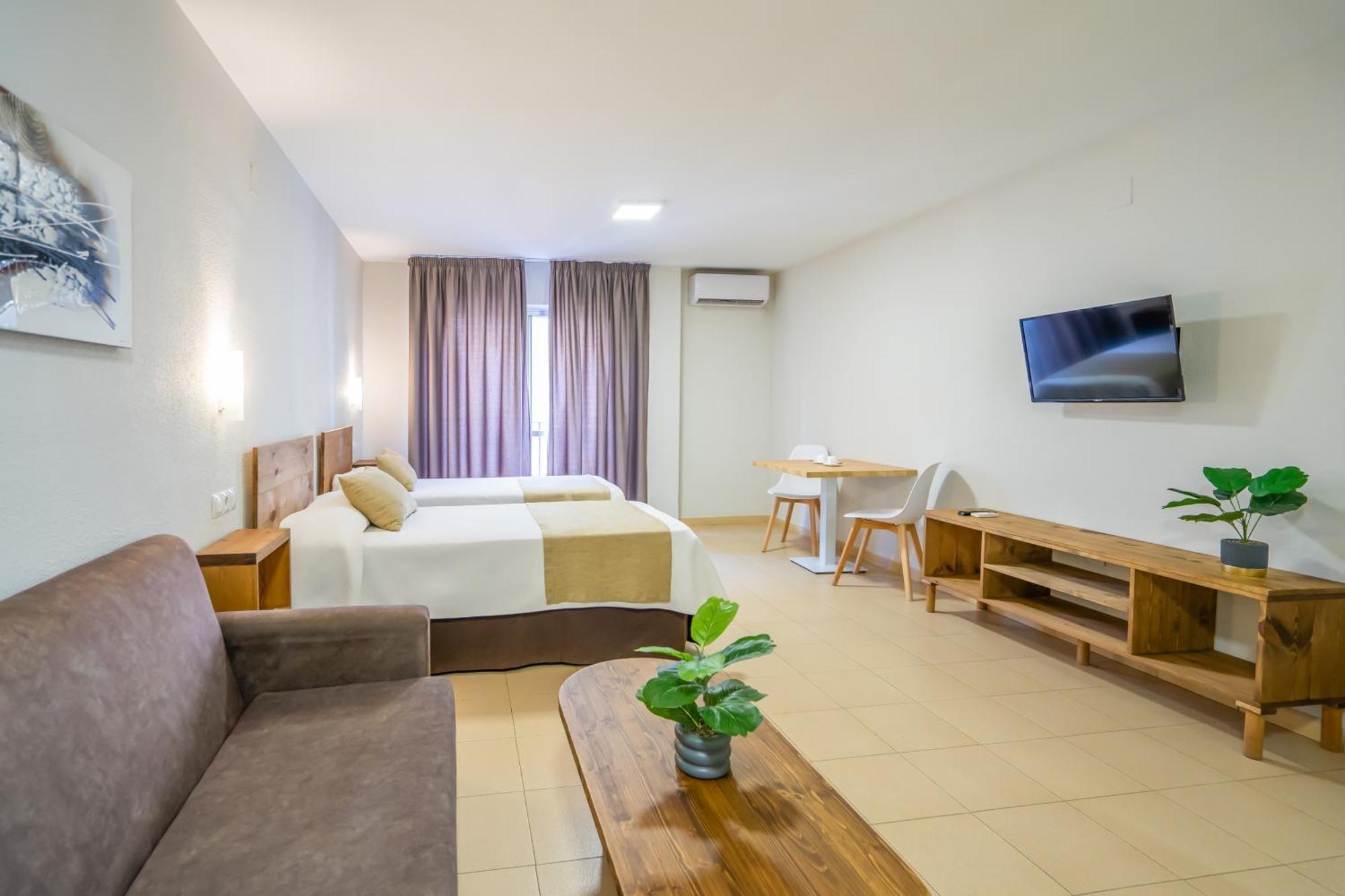 อปาร์ตาเมนโตส ปวยร์ตา เดล ซูร์ Apartment เซบีญา ภายนอก รูปภาพ